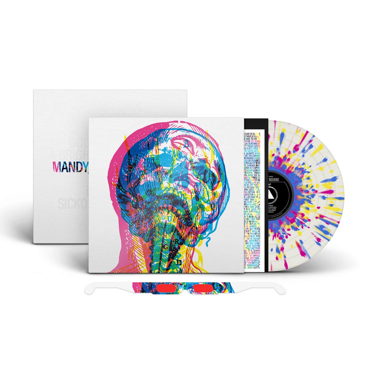 A vinyl recording showcasing the cover, a reverse side with the title "MANDY" (the rest hidden by the front), a pair of paper glasses with red lenses, part of a lyric sheet, and the record itself, featuring indigo, magenta and yellow splatters